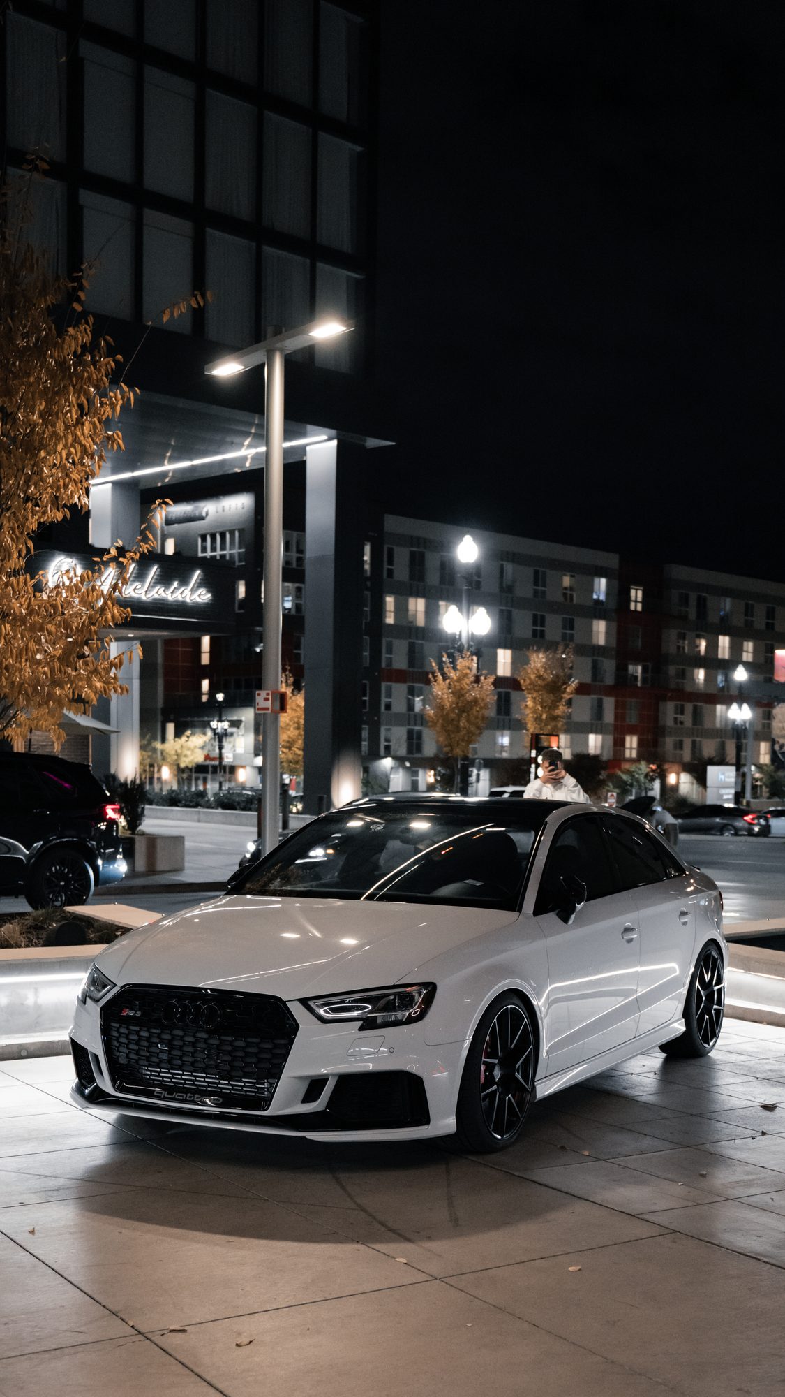 White RS3 parked at night
